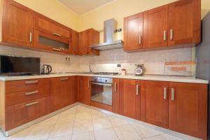 A kitchen or kitchenette at Apartments via Spano