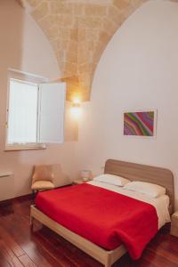 Postel nebo postele na pokoji v ubytování Tulliani Residenze Matera