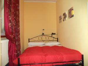 A bed or beds in a room at Hotel Il Nibbio