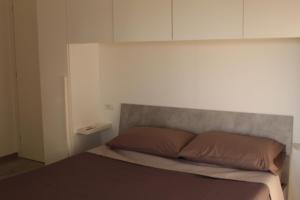 Postel nebo postele na pokoji v ubytování Casamare Puglia