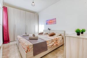 Llit o llits en una habitació de Apartment in Marsaskala