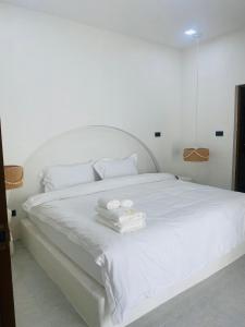 Huang Su Villa 7 皇宿7号泳池别墅客房内的一张或多张床位