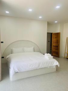 Huang Su Villa 7 皇宿7号泳池别墅客房内的一张或多张床位