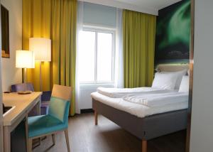 Postel nebo postele na pokoji v ubytování Thon Hotel Kautokeino