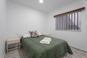 Postel nebo postele na pokoji v ubytování Casa Mela 2