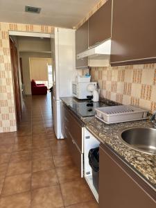 Kuchyň nebo kuchyňský kout v ubytování MAGNO CULLERA- Playa + 20 fotografií