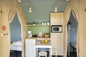 Η κουζίνα ή μικρή κουζίνα στο Camping l'Hermitage