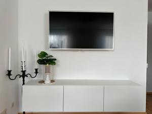 TV a/nebo společenská místnost v ubytování Weitblick Neviges