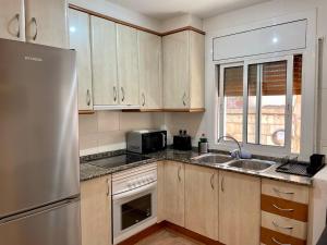 Kuchyň nebo kuchyňský kout v ubytování Beautiful rooms for rent in Tarragona center