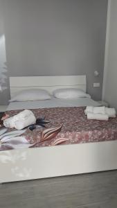 Postel nebo postele na pokoji v ubytování B&B RAFFAELA