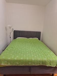 Postel nebo postele na pokoji v ubytování Apartman Pašićeva