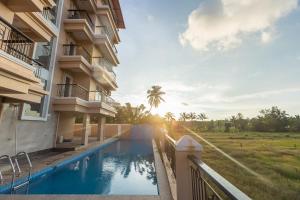 Bazen v nastanitvi oz. blizu nastanitve Tranquil 1BHK suite Pool Field Calangute Da Alohas