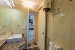 Kopalnica v nastanitvi Tranquil 1BHK suite Pool Field Calangute Da Alohas