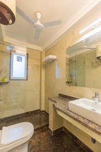 Kopalnica v nastanitvi Tranquil 1BHK suite Pool Field Calangute Da Alohas