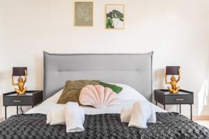 Postel nebo postele na pokoji v ubytování Le Solaris 3 chambres avec 2 grands lits et 3 simples