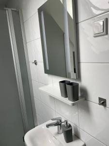 Ένα μπάνιο στο Appartement 1 - Einzimmerwohnung mit Küche und Bad