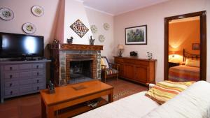 A television and/or entertainment centre at Villa Maro Casitas Select