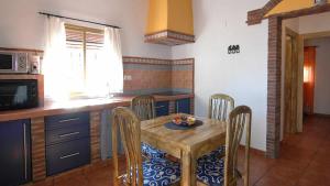 Kuchyňa alebo kuchynka v ubytovaní Cortijo Mirador Casitas Select