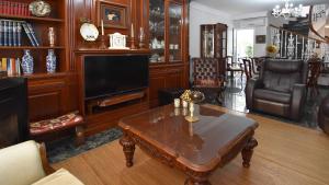 A television and/or entertainment centre at Casa Jimena