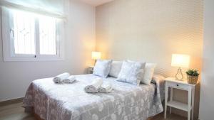 Posteľ alebo postele v izbe v ubytovaní Villa Garcia Jaime Casitas Select