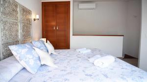 Posteľ alebo postele v izbe v ubytovaní Villa Garcia Jaime Casitas Select