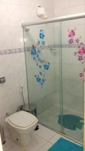 Ванная комната в Quarto aconchegante Jatiúca
