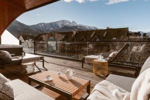 a balcony with a view of a mountain at Mountain Diamond Resort in Zakopane