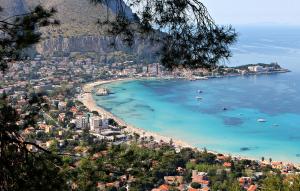 a view of a beach with boats in the water at B&B Le Muse in Mondello