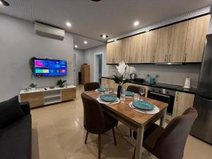Η κουζίνα ή μικρή κουζίνα στο Cattleya Apartment +3 φωτογραφίες