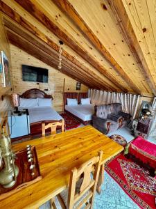 Posezení v ubytování Panorama Lodge-Sous Les Étoiles Lac Ouiouane