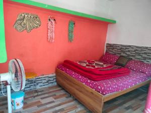 Ein Bett oder Betten in einem Zimmer der Unterkunft Moon Hotel Tungnath