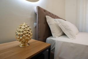 Postel nebo postele na pokoji v ubytování Lues Rooms