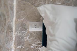 Postel nebo postele na pokoji v ubytování Lues Rooms