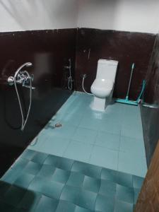 Ein Badezimmer in der Unterkunft Moon Hotel Tungnath