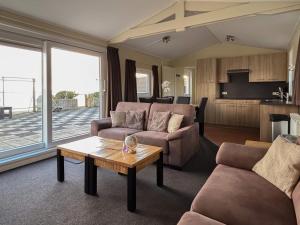 Posezení v ubytování VISSERSLUST Rooms, Apartments and Houseboats