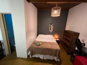 Postel nebo postele na pokoji v ubytování Caju com Mel