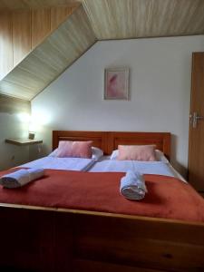 Postel nebo postele na pokoji v ubytování Guest House Kovalik