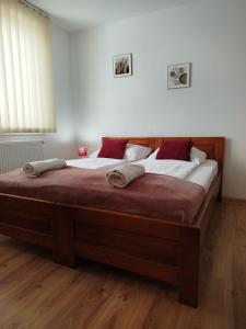 Postel nebo postele na pokoji v ubytování Guest House Kovalik