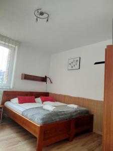 Postel nebo postele na pokoji v ubytování Guest House Kovalik