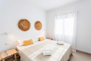 Ένα ή περισσότερα κρεβάτια σε δωμάτιο στο Villa Sol A