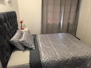 Postel nebo postele na pokoji v ubytování Serene Home