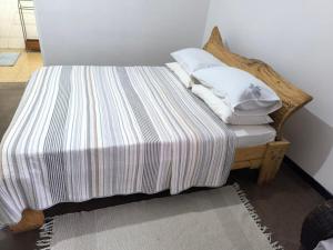 Postel nebo postele na pokoji v ubytování Serene Home