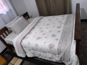 Postel nebo postele na pokoji v ubytování Serene Home
