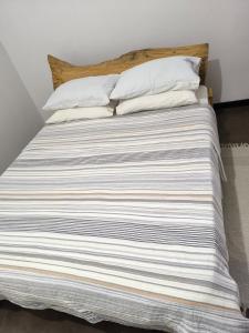 Postel nebo postele na pokoji v ubytování Serene Home