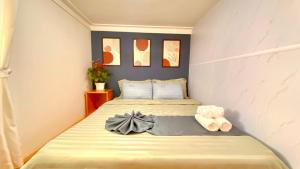 Postel nebo postele na pokoji v ubytování Lê Mùi Hotel - Apartment