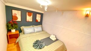 Postel nebo postele na pokoji v ubytování Lê Mùi Hotel - Apartment