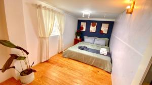 Postel nebo postele na pokoji v ubytování Lê Mùi Hotel - Apartment