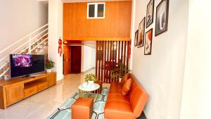 TV a/nebo společenská místnost v ubytování Lê Mùi Hotel - Apartment