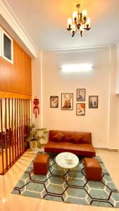 Posezení v ubytování Lê Mùi Hotel - Apartment