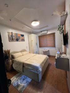 Postel nebo postele na pokoji v ubytování LOGA Apartment